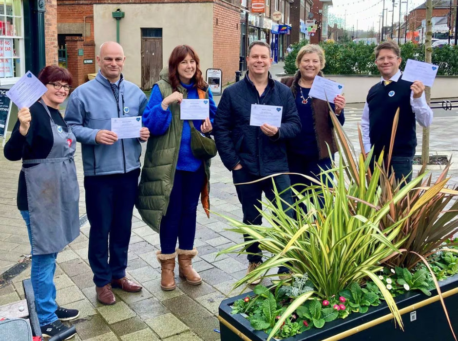 Pictured with invitations to the meeting are, from left, Clare Pommeroy of Nan’s Café, Mayor of Shifnal Roger Cox, Shifnal resident Sarah Weale-Smith, Jan Coulson of Shifnal Town Council, Sally Themans of Love Shifnal and Adam Cawley of Woods the Cleaners.